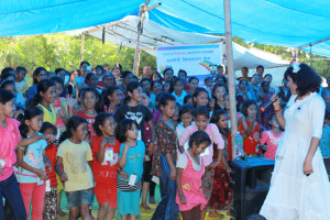 National singer entertaing children at Child Friendly Space established by VOC
